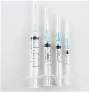 Safety Syringe with Retractable Needles